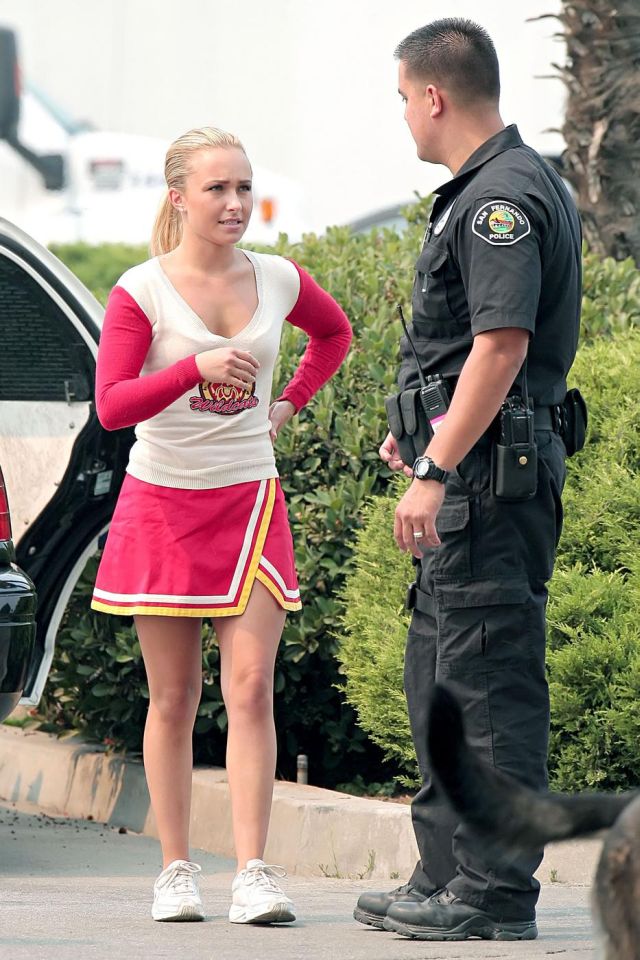 Hayden Panettiere in a pink cheerleader outfit. It fits her good (9 pics)