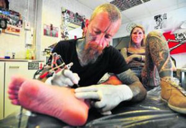 Divorcee Celebrates By Tattooing Entire Body