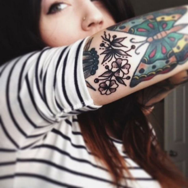 Tattoo Lovers Gather around for Epic Body Art