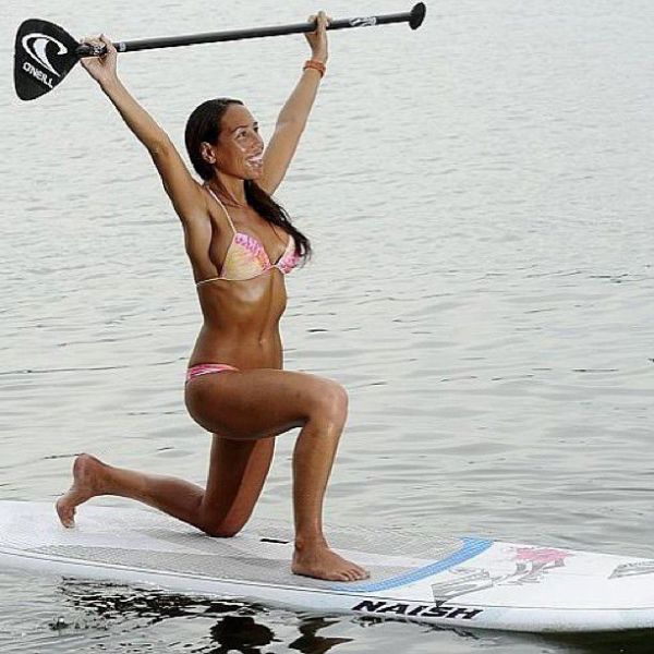 Surfboard Yoga Is a Fun New Form of Beach Exercise
