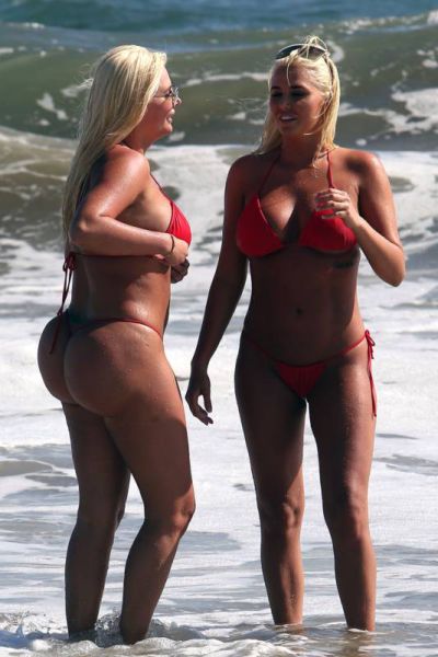 Hugh Hefner’s Ex-Girlfriends Look Hot Eating Fast Food on the Beach