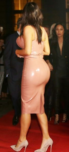 Kim Kardashian Squeezes Her Curves into Pink Latex