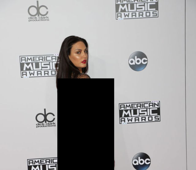 Albanian Singer Arrives at AMA’s Wearing Almost Nothing