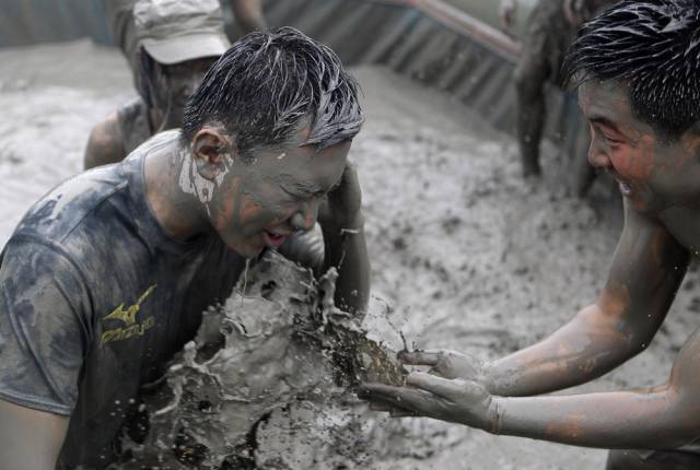 Partiers Get Crazy Messy at the South Korean Mud Festival