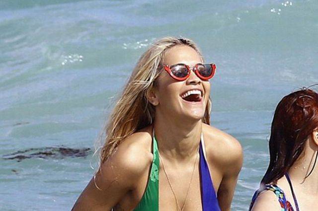Rita Ora Shows Off Her Sexy Body In A Low Cut Swimsuit On The Miami Beach