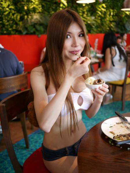 A Chinese Model Earns Money By Walking Around Half-Naked