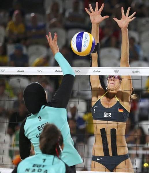 Cultural Differences Are Visible With The Naked Eye During A Beach Volleyball At The Olympics