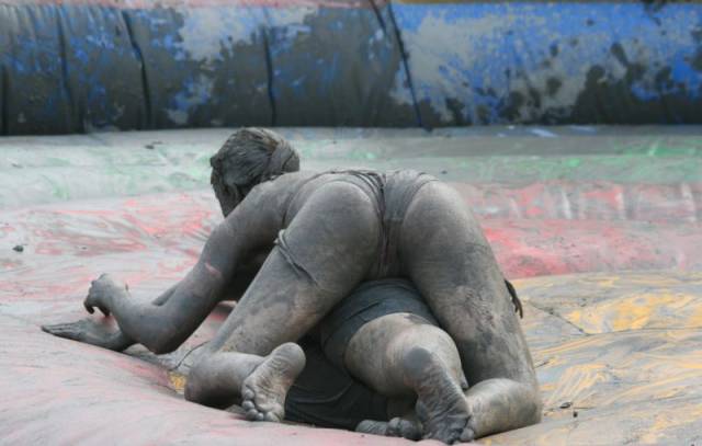 Girls Having Fun At The Korean Mud Festival